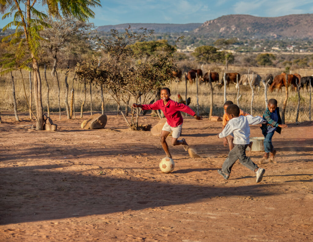 African children playing soccer – Headstart Kids